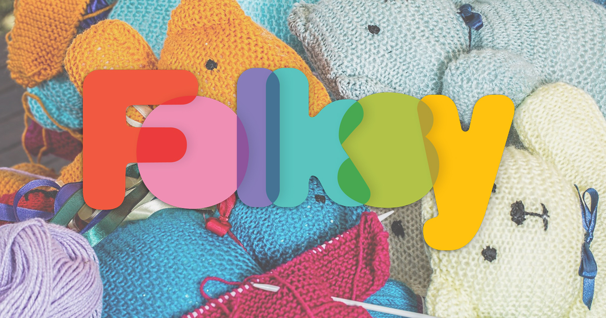 Folksy logo on background of knitted teddy bears